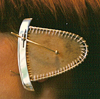 TAIKO-pyha-rumpu-korvakoru-v.1985-sterling-hopea-nahkakalvo.jpg